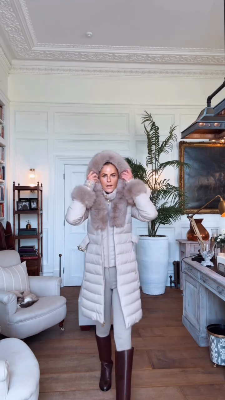 Beige belted down jacket