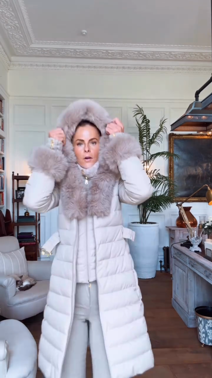 Beige belted down jacket