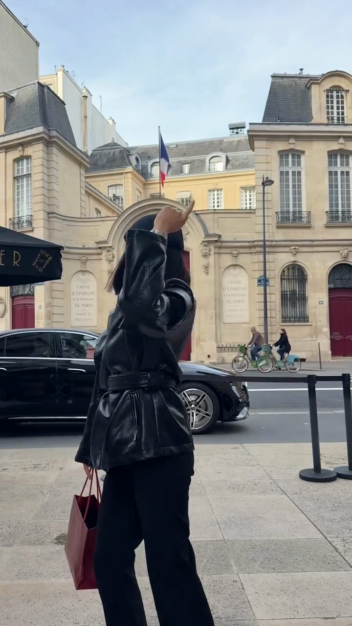 Black slim-fit belted leather jacket