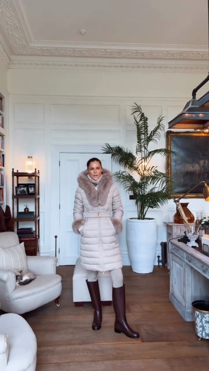 Beige belted down jacket